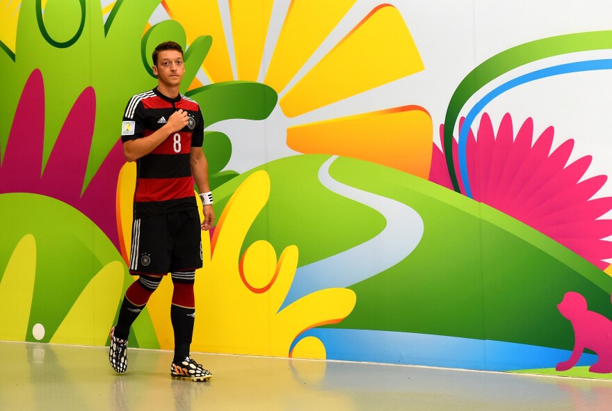 Mesut Oezil of Germany looks on in the tunnel prior to the 2014 FIFA World Cup Brazil Group G match between USA and Germany at Arena Pernambuco on June 26, 2014 in Recife, Brazil.  