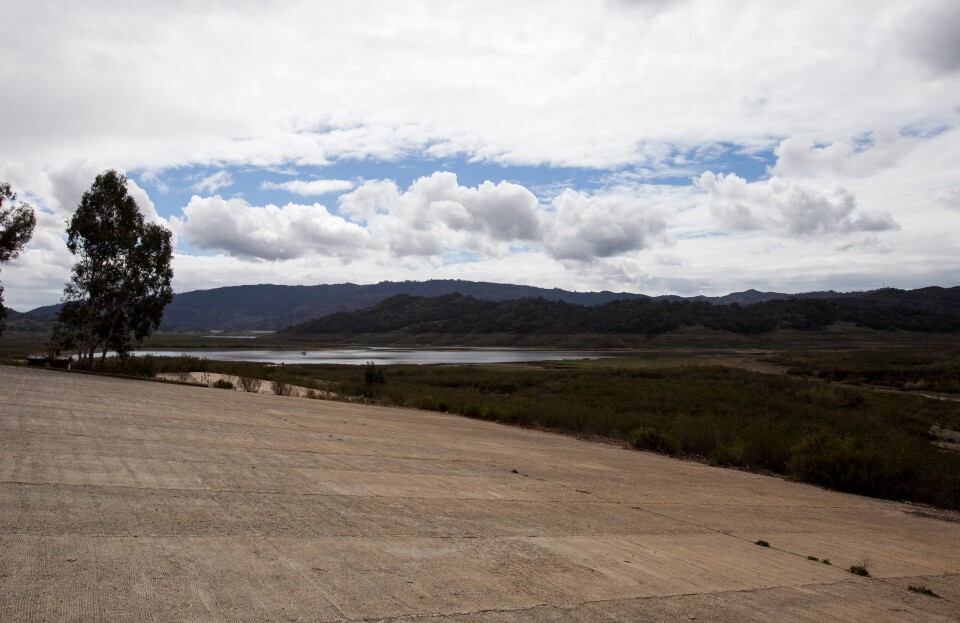 A boat ramp, which used to be submerged in Lake Casitas, now sits dry hundreds of yards from the edge of the water.