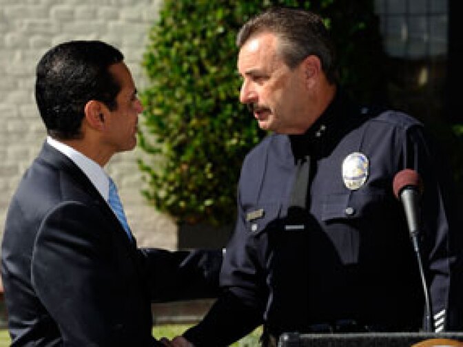 Los Angeles Mayor Antonio Villaraigosa (L) congratulates Los Angeles Police Department Deputy Chief Charles Beck after he was announced as the mayor's selection to be the new Chief of Police at a news conference at the Getty House, the official residence of the mayor, on November 3, 2009 in Los Angeles, California.