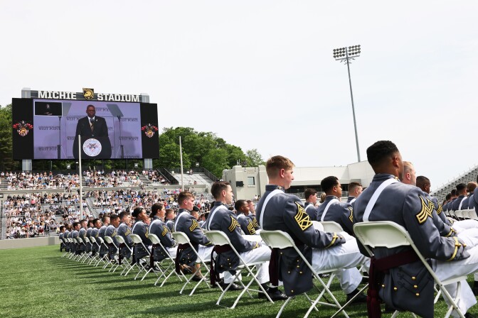 WEST POINT, NEW YORK - MAY 22: West Point graduates watch as U.S. Secretary of Defense Lloyd J. Austin III speaks during the 2021 West Point Commencement Ceremony on May 22, 2021 in West Point, New York. U.S. Secretary of Defense Lloyd Austin returned to his alma mater to deliver the U.S. Military Academy’s Class of 2021 commencement address. There are 995 cadets in this years graduation class.  (Photo by Michael M. Santiago/Getty Images)