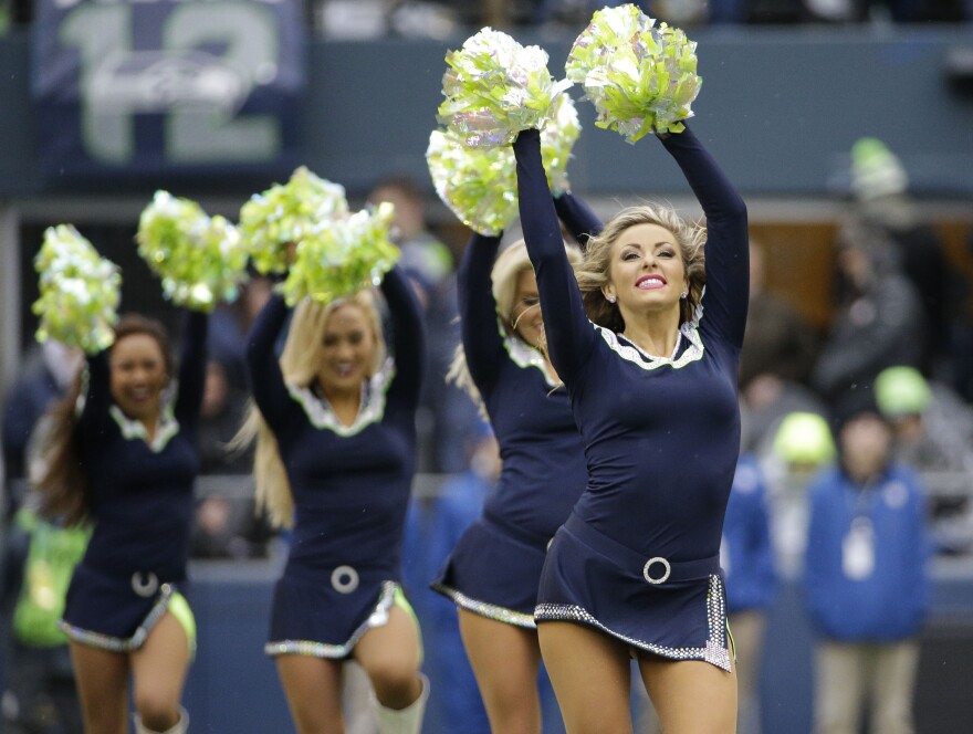 The Seattle Seahawks cheerleaders perform during the first half of the NFL football NFC Championship game against the Green Bay Packers Sunday, Jan. 18, 2015, in Seattle. (AP Photo/David J. Phillip)