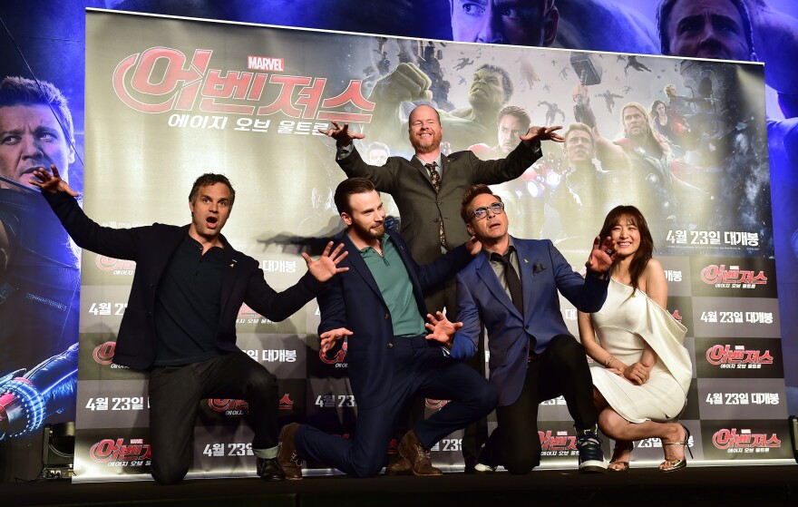 (L-R) US actors Mark Ruffalo, Chris Evans, Robert Downey Jr, South Korean actress Kim Soo-Hyun pose with US director Joss Whedon (top C) for a photo session during a press conference to promote Marvel's "Avengers: Age Of Ultron" in Seoul on April 17, 2015. The film will open in Seoul Korea on April 23, 2015. AFP PHOTO / JUNG YEON-JE        (Photo credit should read JUNG YEON-JE/AFP/Getty Images)