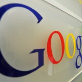 Google logo is seen on a wall at the entrance of the Google offices in Brussels on February 5, 2014. 