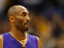 MINNEAPOLIS, MN - DECEMBER 14: Kobe Bryant #24 of the Los Angeles Lakers looks on during the fourth quarter of the game against the Minnesota Timberwolves on December 14, 2014 at Target Center in Minneapolis, Minnesota. The Lakers defeated the Timberwolves 100-94. NOTE TO USER: User expressly acknowledges and agrees that, by downloading and or using this Photograph, user is consenting to the terms and conditions of the Getty Images License Agreement. (Photo by Hannah Foslien/Getty Images)