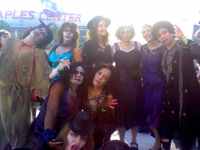 Ghoulish characters get ready to dance to Thriller at L.A. Live