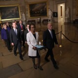 WASHINGTON, DC - JANUARY 15: Articles of Impeachment against U.S. President Donald Trump are formally carried through the Rotunda of the U.S. Capitol by officials from the U.S. House of Representatives to the U.S. Senate on January 15, 2020 in Washington, DC. The impeachment trial in the Senate is expected to begin early next week. Carrying the articles of impeachment is Clerk of the House of Representatives Cheryl Johnson accompanied by House Sergeant of Arms Paul Irving and managers appointed by Speaker of the House Nancy Pelosi including Rep. Adam Schiff (D-CA), Rep. Jerry Nadler (D-NY), Rep. Zoe Lofgren (D-CA), Rep. Hakeem Jeffries (D-NY), Rep. Val Demings (D-FL), Rep. Jason Crow (D-CO) and Rep. Sylvia Garcia (D-TX). (Photo by Win McNamee/Getty Images)