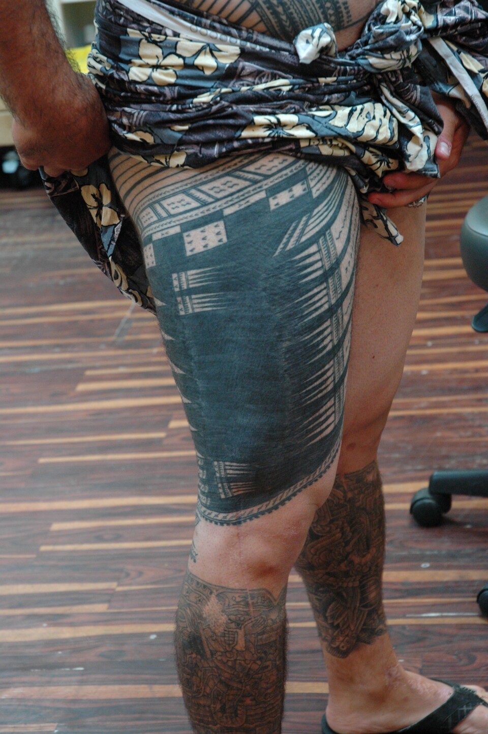 David Demarco, of Garden Grove, shows the progress on his pe'a thus far.
