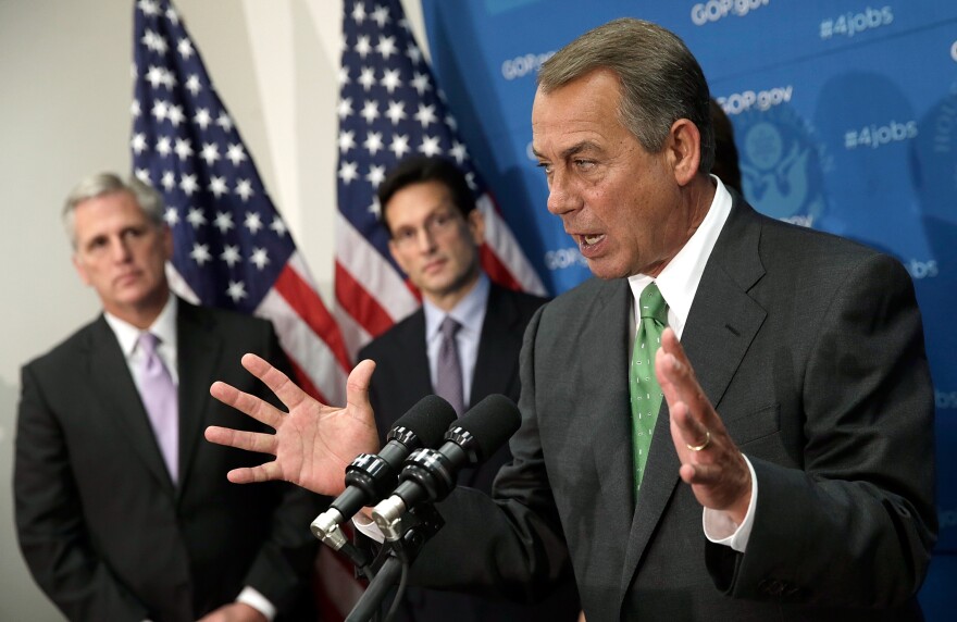 U.S. Speaker of the House John Boehner speaks at a press conference at the U.S. Capitol September 26, 2013 in Washington, DC.  Boehner signaled that he is urging Republican colleagues to remain flexible in negotiations to avert a governmental shutdown when federal funding runs out next week. Also pictured are (L-R) House Majority Whip Kevin McCarthy (R-CA) and House Majority Leader Eric Cantor (R-VA). 