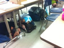 The 3rd grade class at Rosemont Elementary School in Los Angeles participates in the Great ShakeOut earthquake drill that occurred at exactly 10:17a.m. across the country on Thursday, October 17, 2013.