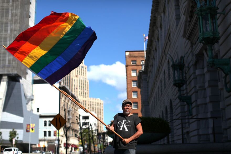 Bob Sodervick waves a gay pride flag outside of the Ninth U.S. Circuit Court of Appeals on June 5, 2012 in San Francisco, California.  A federal appeals court announced that it will not rehear arguments on the California's controversial Prop 8 same-sex ban paving the way for the case to go to the U.S. Supreme Court. In February, a three-judge panel of the 9th U.S. Circuit Court of Appeals ruled that the same-sex marriage ban discriminated against gays and lesbians. 