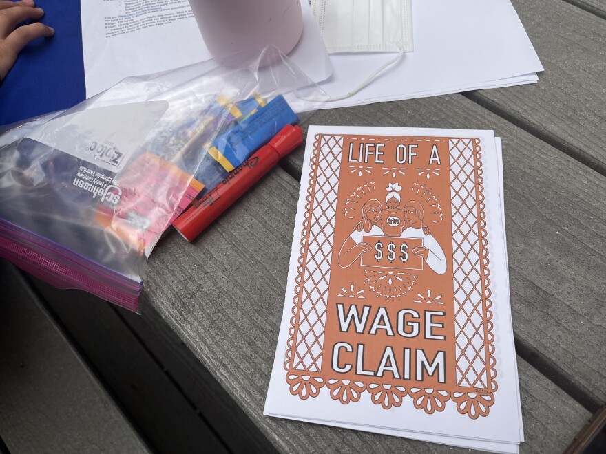 A small handmade life of a wage claim booklet.