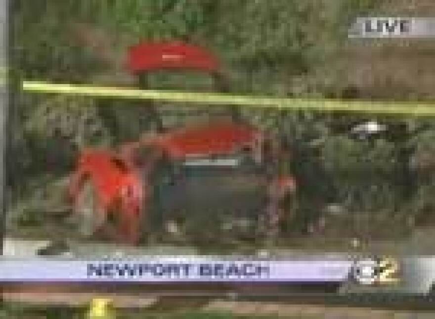 Ferrari split in half by light pole in deadly crash