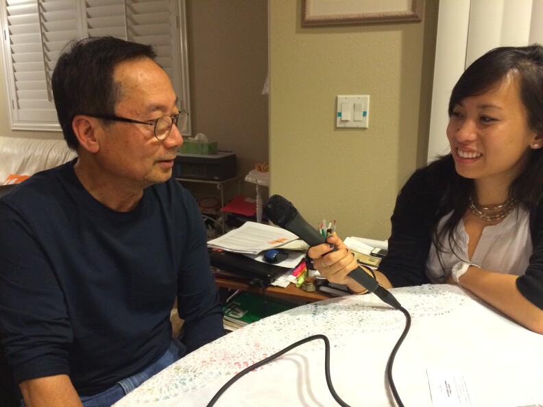 Yvonne Tran, right, talks with her father, Lam, about his memories of Saigon in April 1975 and how he made his way to California, after arriving at a refugee camp in Guam.