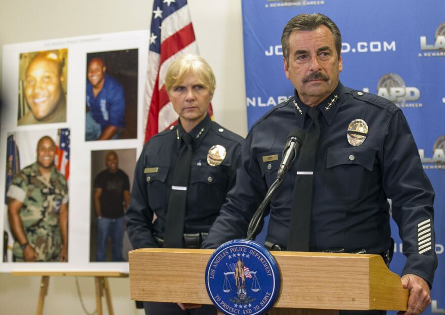 Los Angeles police Chief Charlie Beck, right,  comments on fired officer, Christopher Dorner,  Dorner's multiple weapons, including an assault rifle, during a news conference at the LAPD headquarters in Los Angeles Thursday, Feb. 7, 2013. Police launched a massive manhunt for a former Los Angeles officer suspected of going on a killing spree, slaying a couple over the weekend, opening fire on two Los Angeles officers early Thursday and then ambushing two other police officers, killing one. At left, Assistant Chief Sandy Jo MacArthur.