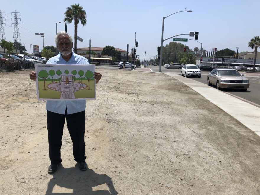 Gonzalo Jr. holds a rendering of the park that will fill the empty space behind him. The park will commemorate his father's victory in eliminating Mexican-only schools in Westminster.