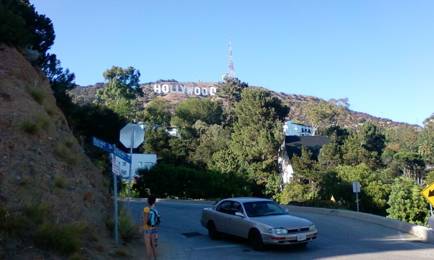 A hiker at the corner of Durand Dr. at Griffith Park. 