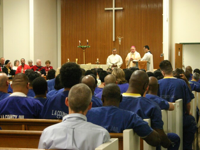 About 200 inmates at Men's Central Jail in downtown Los Angeles attend Christmas Day morning mass lead by Archbishop Jose Gomez of Los Angeles. 