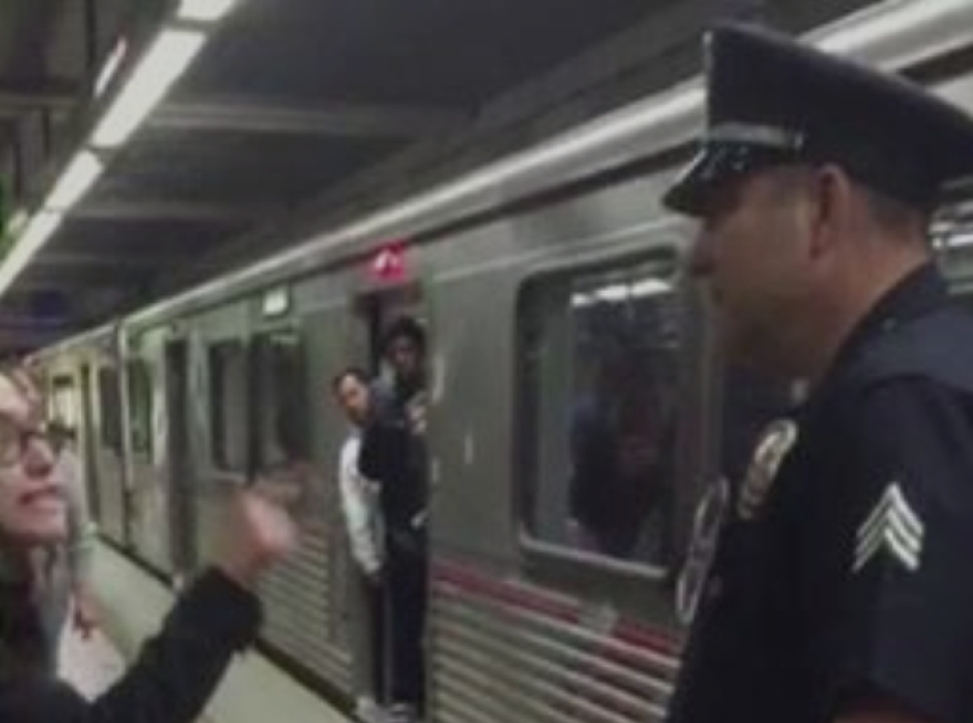 A video posted to Facebook shows a Los Angeles police officer pulling a young woman off the subway. She can be heard complaining that she was removed for having her feet on the seat.