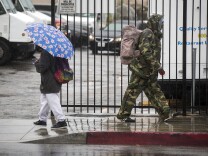 Rain falls over Pasadena on Tuesday, Jan. 5, 2015. A series of storms is expected to dump up to six inches of rain on the Southland this week.
