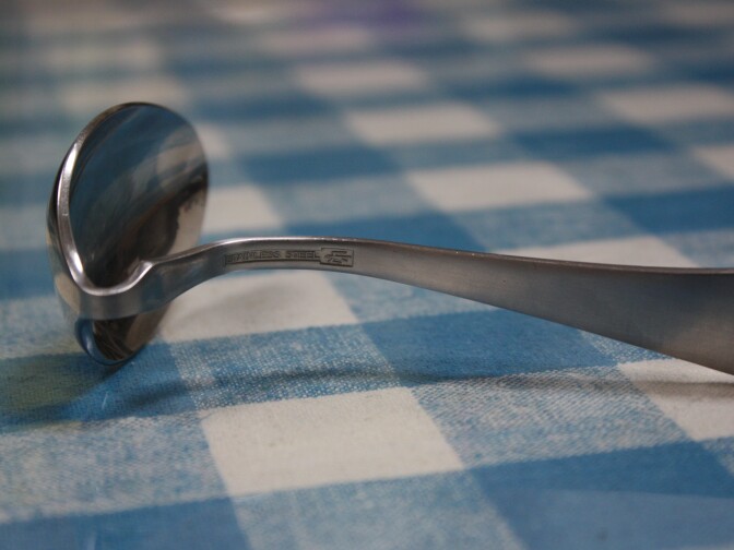 Photo of bent spoon. 