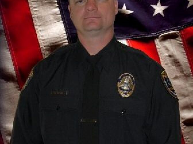 Riverside Police Department Officer Michael Crain, who was killed Thursday morning, February 7, 2013 allegedly by murder suspect Christopher Dorner. Services for Crain were held Wednesday, Feb. 13. The Riverside Police Dept. Twitter account removed a tweet the morning of the shooting which in part read "RPD officer murdered."