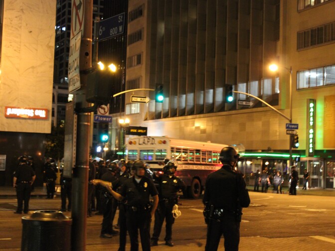 LAPD bus hauling protesters away.