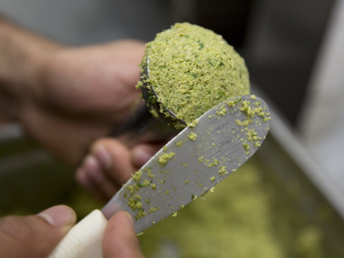 A falafel being prepared for cooking at Kareem's Restaurant in Anaheim, California on September 28th, 2016.