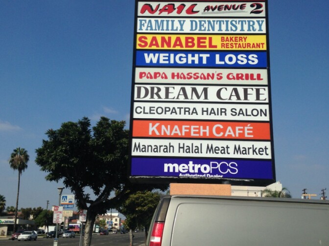 A mini-mall sign on Brookhurst Avenue in Anaheim captures the array of businesses in what is unofficially known as Litte Arabia, which cater to immigrants from the Middle East and visitors to the area. 