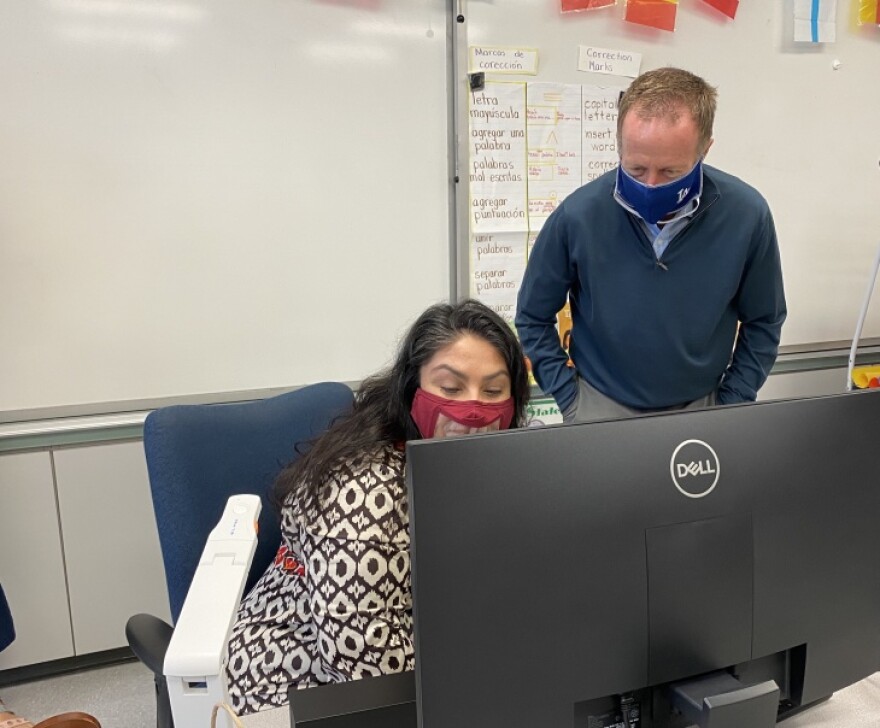 LAUSD Superintendent Austin Beutner (left) drops into John W. Mack Elementary School first grade teacher Leticia Duggan's lesson on Zoom on April 12, 2021 — one day before Duggan's students are set to return to school.