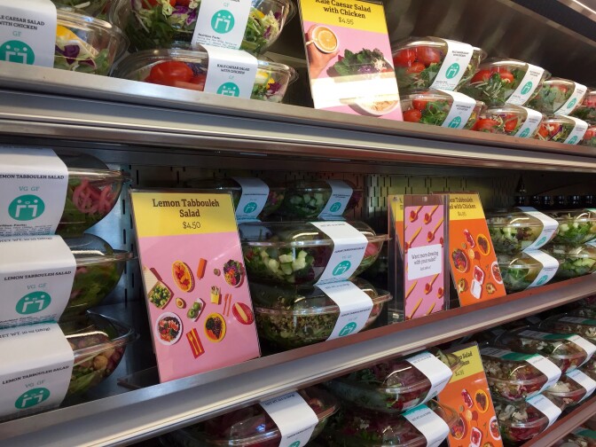 Various salads are displayed at Everytable’s South L.A. location.