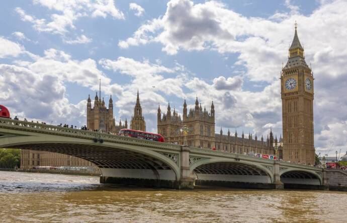 Big Ben and the Houses of Parliament are seen across the Thames River.