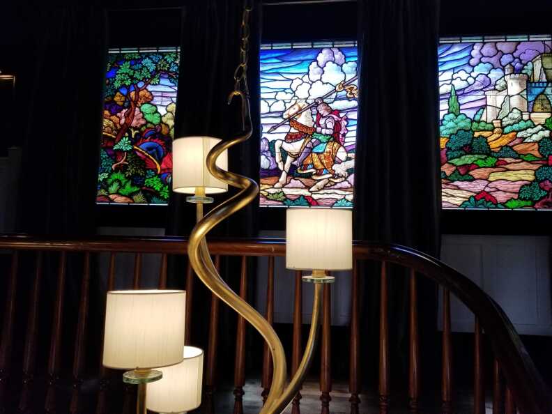 St. George the dragon Slayer is depicted in this triptych at the top of the grand staircase