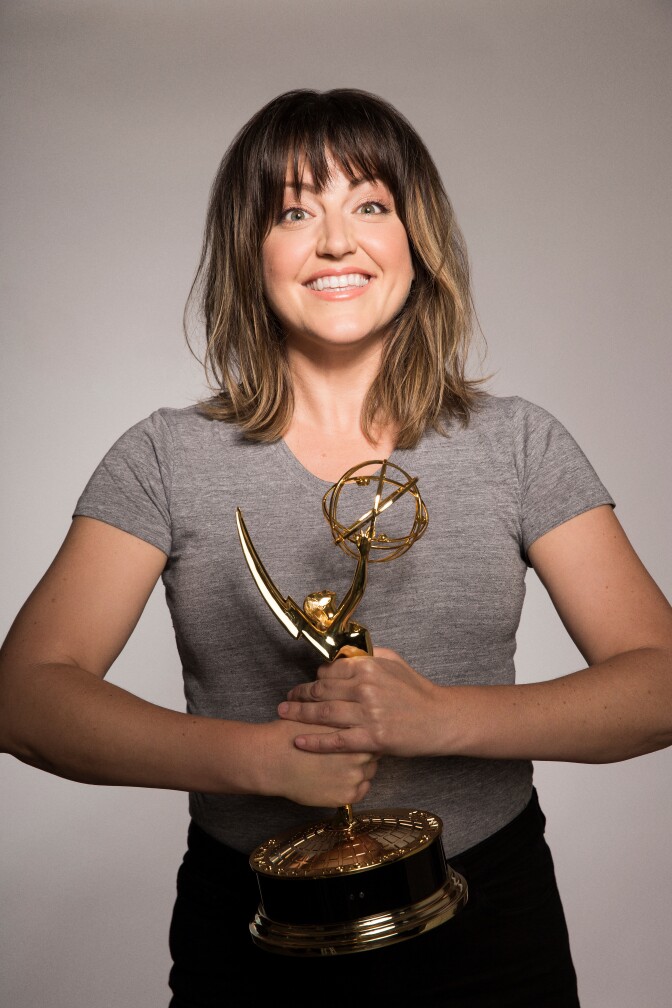 Choreographer Kat Burns holds the Emmy she won for choreography for the CW show "Crazy Ex-Girlfriend."