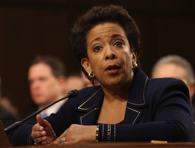 File: U.S. Attorney for the Eastern District of New York Loretta Lynch testifies during her confirmation hearing before the Senate Judiciary Committee Jan. 28, 2015 on Capitol Hill in Washington, D.C. The 12 to 8 vote in the Judiciary Committee sent Loretta Lynch's nomination to the full Senate.