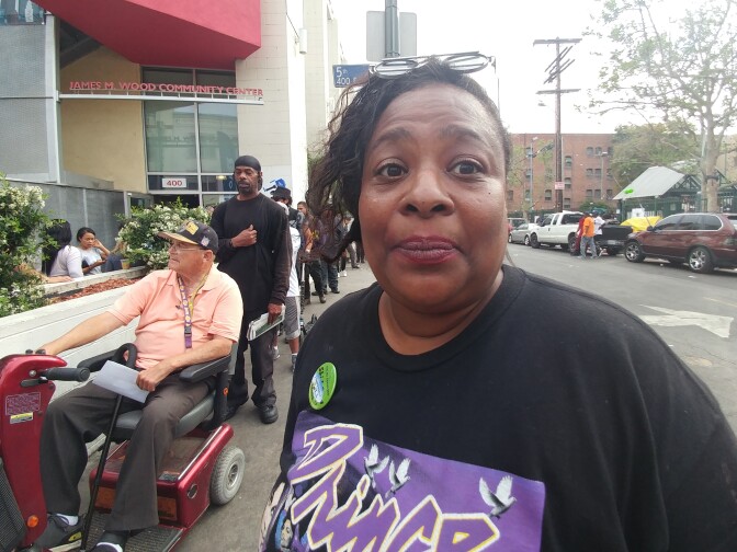 Sherry Wright, a long-time resident of Skid Row stands in line outside the James M. Wood Community Center on Thursday April 6, 2017. 