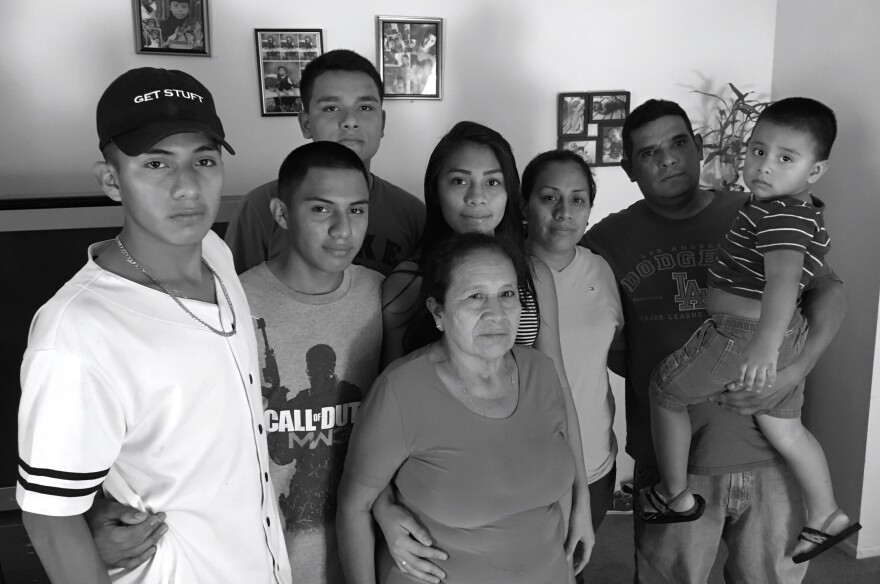 The extended Hernández-Gonzalez family in their home in La Quinta. The two boys, Alejandro, far left, and Luis, second from left, were both granted asylum in 2015 after fleeing violence in El Salvador.