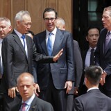 WASHINGTON, DC - MAY 10: Chinese Vice Premier Liu He (2nd L) says goodby to U.S. Treasury Secretary Steven Mnuchin (C) and U.S. Trade Representative Robert Lighthizer as they break from meetings at the USTR offices May 10, 2019 in Washington, DC. The leaders from China and the U.S. met Friday, hours after President Donald Trump imposed tariffs on $200 billion on Chinese goods (Photo by Chip Somodevilla/Getty Images)