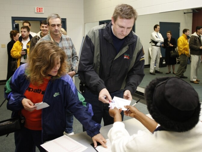 Voters Arlene and Michael Cochran cast their votes in the South Carolina Republican presidential primary at the Jones Recreational Center in Mount Pleasant, S.C., Jan. 19, 2008. 