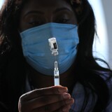 WASHINGTON, DC - MAY 06: DC Health Nurse Manager Ashley Hennigan fills a syringe with a dose of the Johnson & Johnson coronavirus vaccine during a walk-up clinic at the John F. Kennedy Center for the Performing Arts' outdoor Reach area on May 06, 2021 in Washington, DC. Hosted by the District of Columbia Health Department, the event also provided newly vaccinated people with a free beer courtesy of Solace Brewing Co. (Photo by Chip Somodevilla/Getty Images)