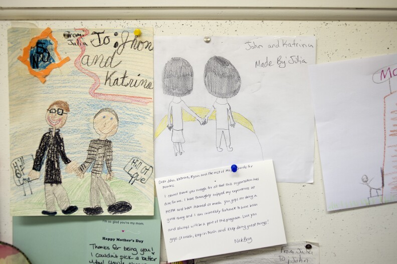 Thank-you notes and student drawings hang on the cork board surrounding the Major Chords for Minors office. Co-founders John and Katrina Vowell let the kids hang out in the office before and after their music lessons to color, talk or do homework.