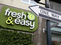 File: A sign is posted outside of a Fresh & Easy grocery store on Dec. 5, 2012 in San Francisco.