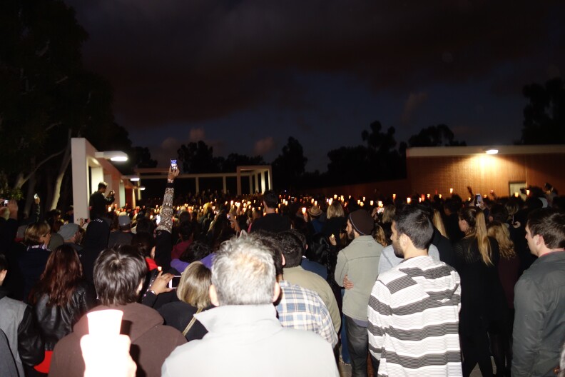Hundreds of Cal State University Long Beach students, faculty and others gathered with candles at a vigil Nov. 15, 2015 for Nohemi Gonzalez. She was the lone American so far known to be killed in the Paris terror attacks.