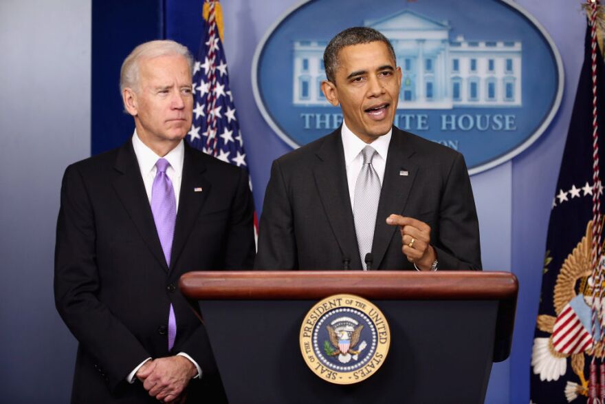 U.S. President Barack Obama (R) announces the creation of an interagency task force for guns as Vice President Joseph Biden listens in the Brady Press Briefing Room at the White House on December 19, 2012 in Washington, DC. President Obama announced that he is making an administration-wide effort to solve gun violence and has tapped Vice President Joe Biden to lead an interagency task force in the wake of the Sandy Hook Elementary School shooting in Newtown, Connecticut.   