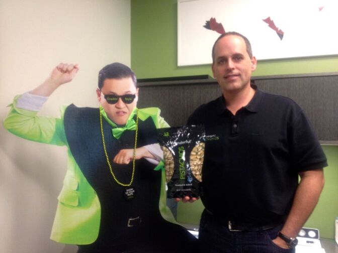 Marc Seguin, vice president of marketing at Paramount Farms, stands next to a cardboard figure of Psy. Psy, the Korean pop star behind "Gangnam Style," is starring in Paramount Farms' first Super Bowl commercial.