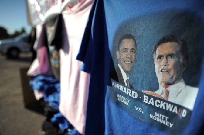 T-shirts with pictures of US President Barack Obama and republican presidential candidate Mitt Romney at a roadside stall in Denver, Colorado, on October 2, 2012.