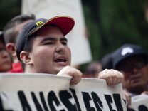 Fast food workers gather at the Central Library in Downtown Los Angeles to protest for a $15 minimum wage.