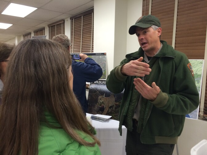 National Park Service biologist Jeff Sikich explains his work studying mountain lions at a recent public meeting for a proposed wildlife crossing in Agoura Hills. 