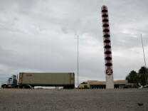 Truck drivers frequent the area around Baker, Calif., Thursday, November 9, 2012. Travelers to and from Las Vegas would use the thermometer to gage the temperature during their trip.