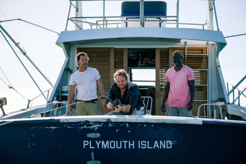Baker Dill (Matthew McConaughey), Frank (Jason Clarke) & Duke (Djimon Hounsou) fish for big game on a dangerous excursion in SERENITY.