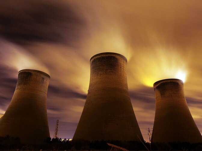 Coal-fueled power stations like this one in Warrington, United Kingdom, are said to be contributing to global warming. But e-mail messages stolen from a group of climate scientists recently are fodder for skeptics who say global warming is a plot, not a real problem.